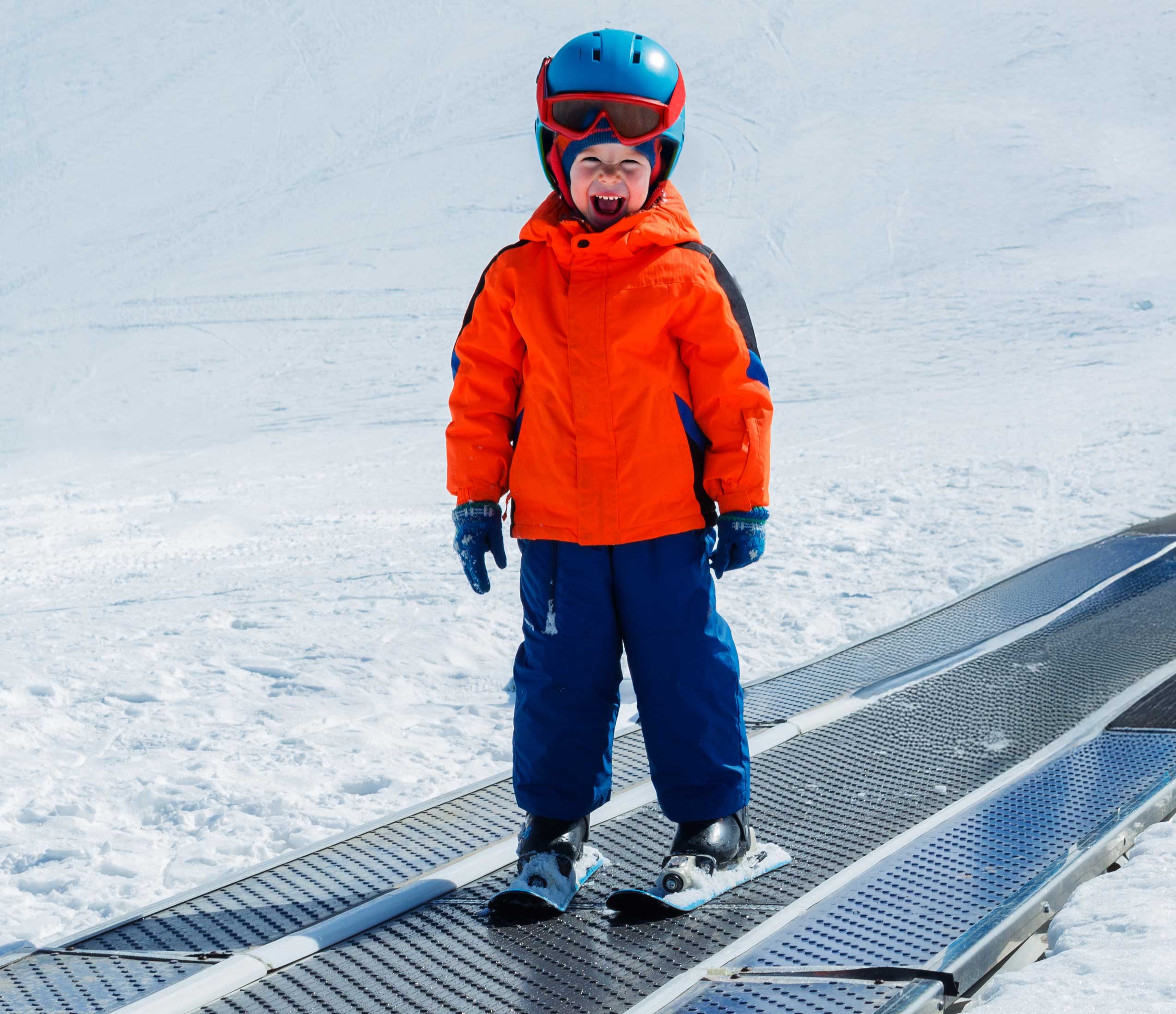 Ski instructor talking to students