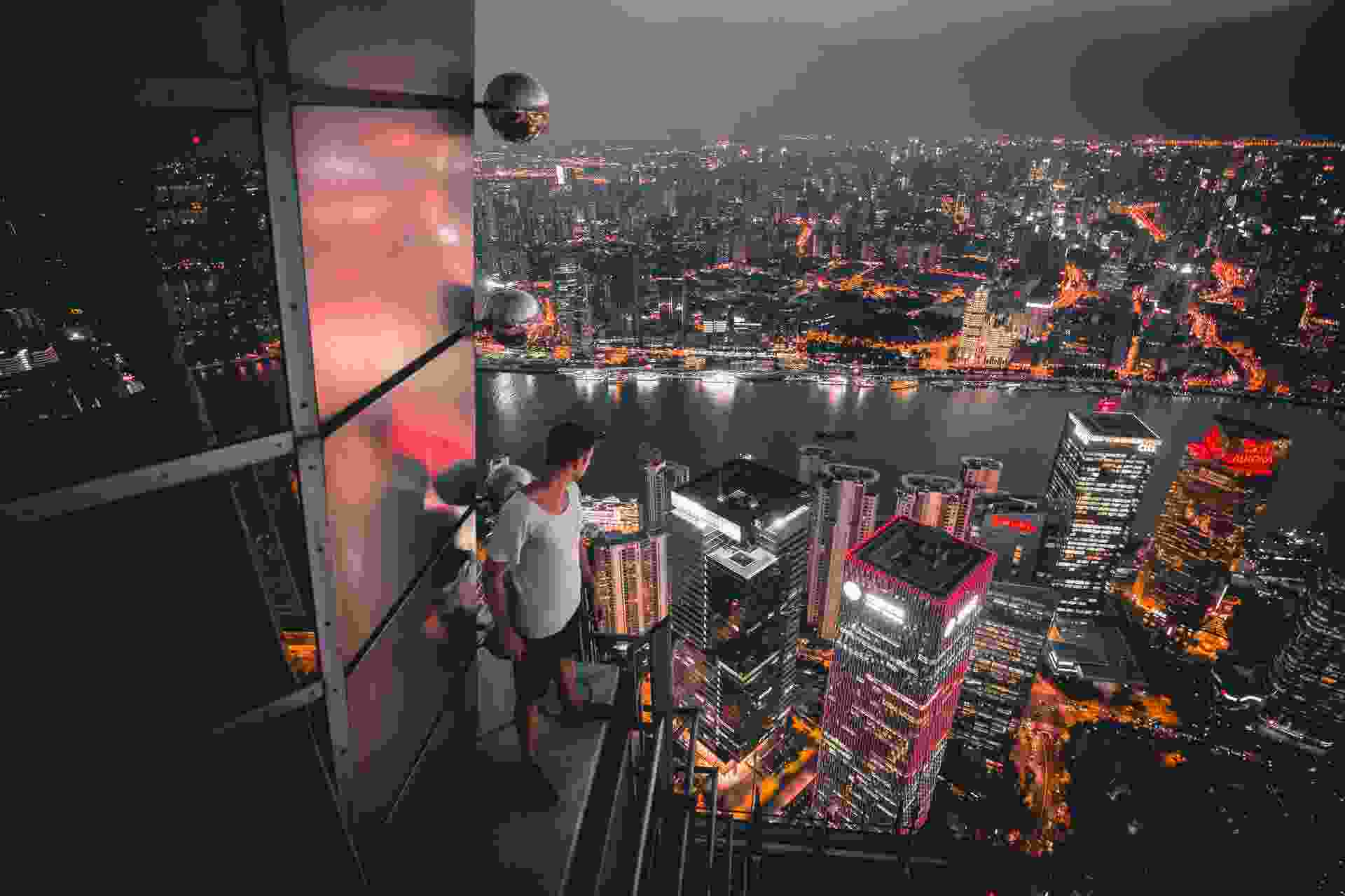 Man posing at the rooftop of Jin Mao Tower Shanghai - China